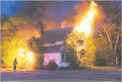 Fire Destroys House On Front Street