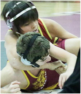 Junior High  Wrestlers  Hit The Mats