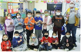 Lions Club Presents Flags To First-Grade Students