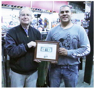 Wolf Den Receives First  Dollar From Chamber