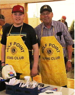 Helping Hands 
	Cole Holen (left) ….