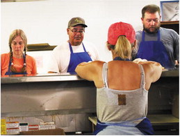 Catholic Hamburgers 
	Volunteers work in ….