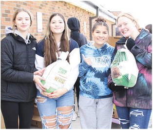 School Group Provides  Turkeys To Families