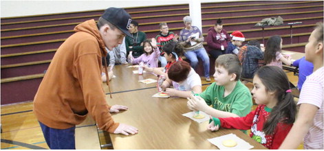 Power Rangers Assist Younger  Students With Cookie Decorating