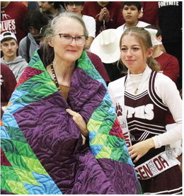 Wolf Point Seniors Present Star Quilts During Senior Night