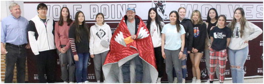 Wolf Point Tennis Players Present Quilt To Driver