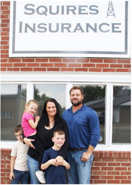 Toews Serving Clients At  Squires Insurance Office