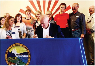 Governor Strengthens Montana  Law For Cancer Survivors