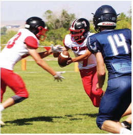 Froid/Lake Stops Bainville In Six Man Football Action Froid/Lake Stops Bainville In Six Man Football Action