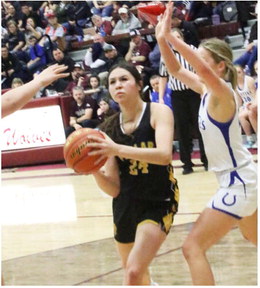 Indians Advance With Win Over Lady Wolves