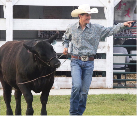 Olson Wins Grand Champion Steer Title