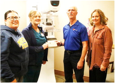 Donation Presented For Tough Enough To Wear Pink Campaign Donation Presented For Tough Enough To Wear Pink Campaign