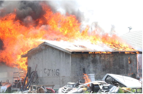 Fire Destroys Structures
