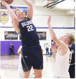 Bainville Holds Off Cowboys In Conference Contest