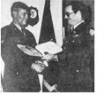 Receives  Medal