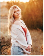 Britton Enjoys Cheer Squad, Art Class