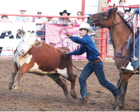 Area Cowboys Compete At Ranch Rodeo
