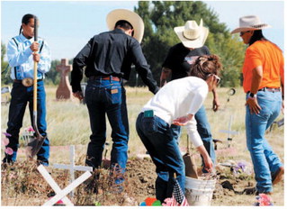 Graveside Services Mark  Week Of Homecoming